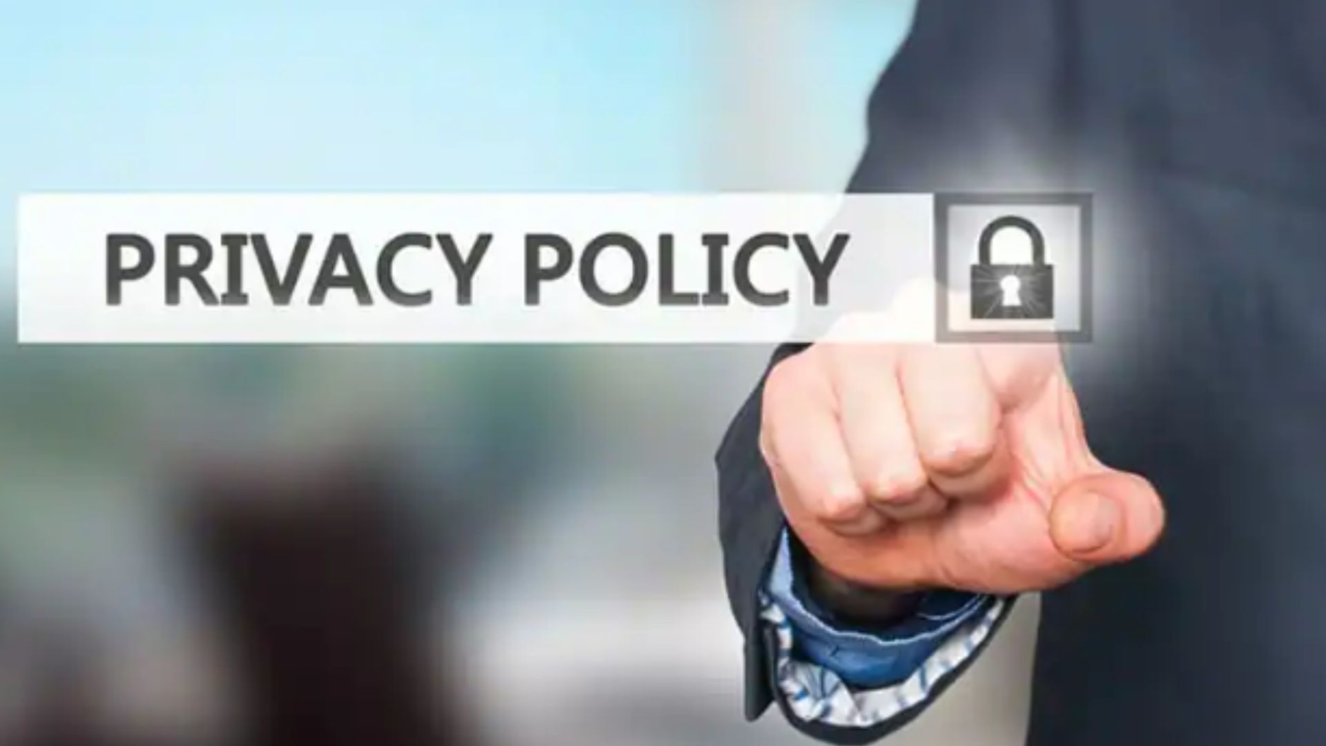 a man wearing a black suit pointing at a card written privacy policy 